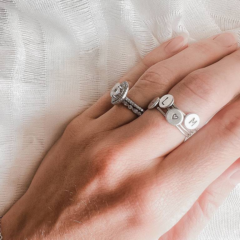 Personalized Dot Stacking Ring by Barberry & Lace Jewelry featuring hand-stamped initials in silver, perfect for layering and everyday wear.