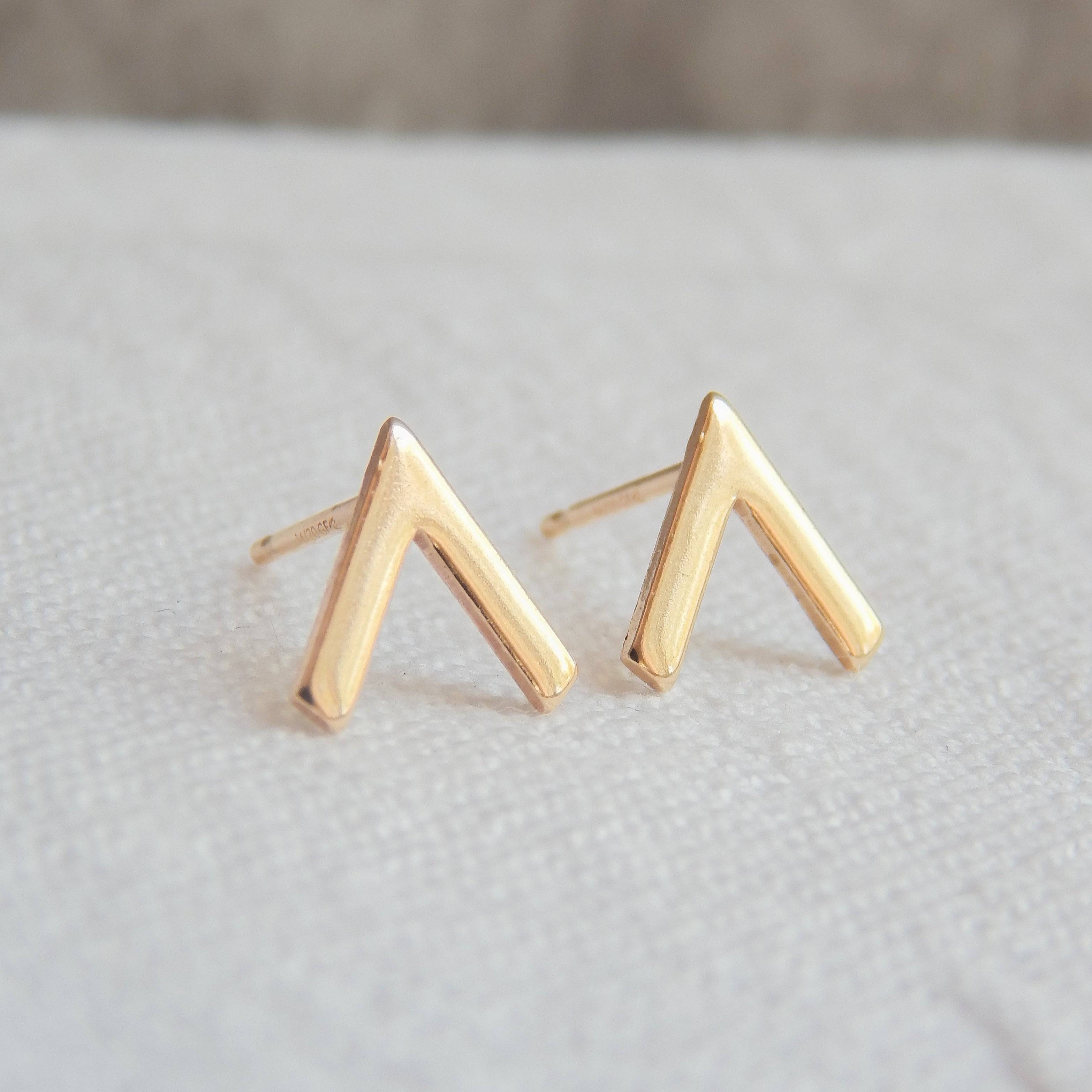 Pair of minimalist Chevron Stud Earrings in gold fill, featuring a sleek, modern V-shape perfect for sensitive ears.