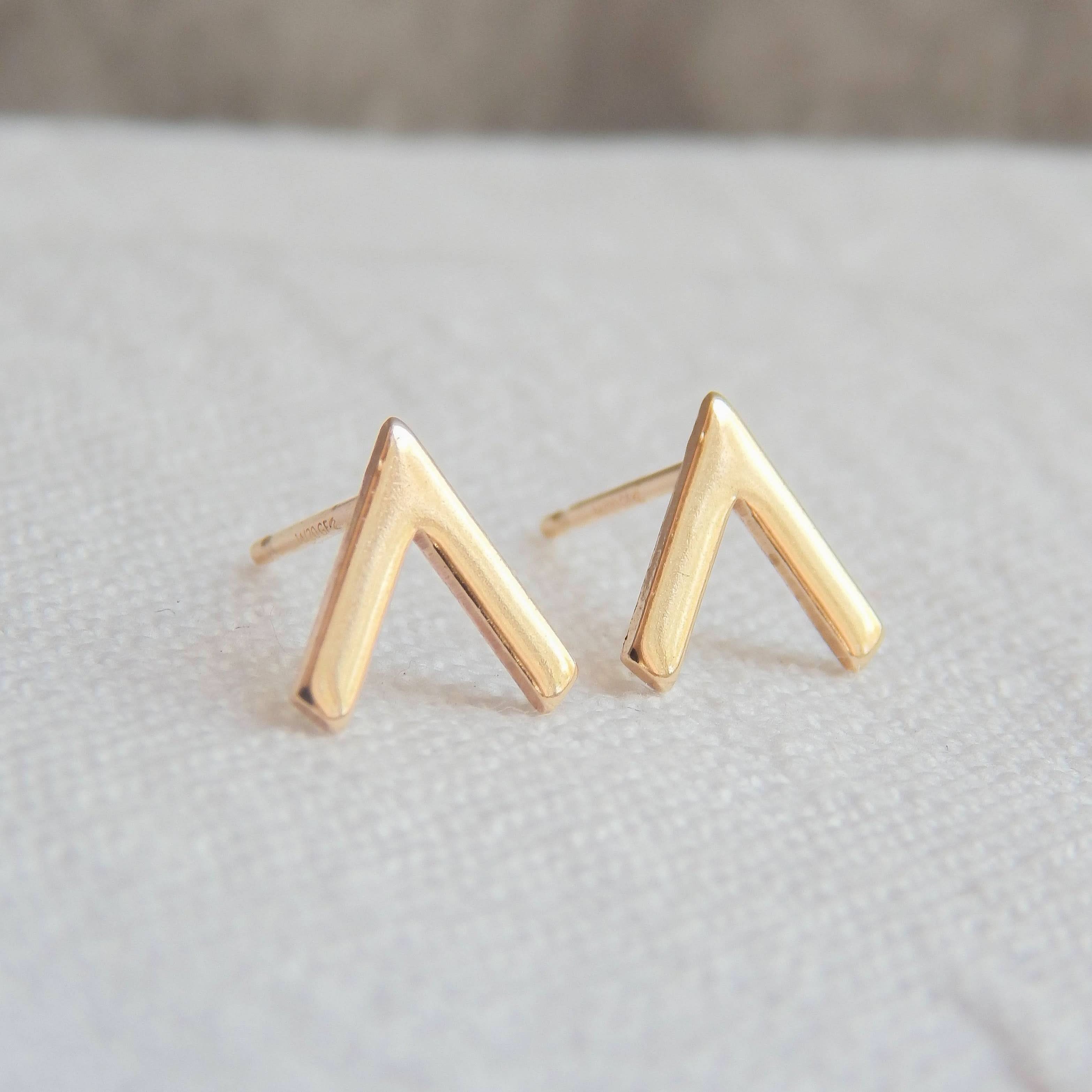 Pair of minimalist Chevron Stud Earrings in gold fill, featuring a sleek, modern V-shape perfect for sensitive ears.