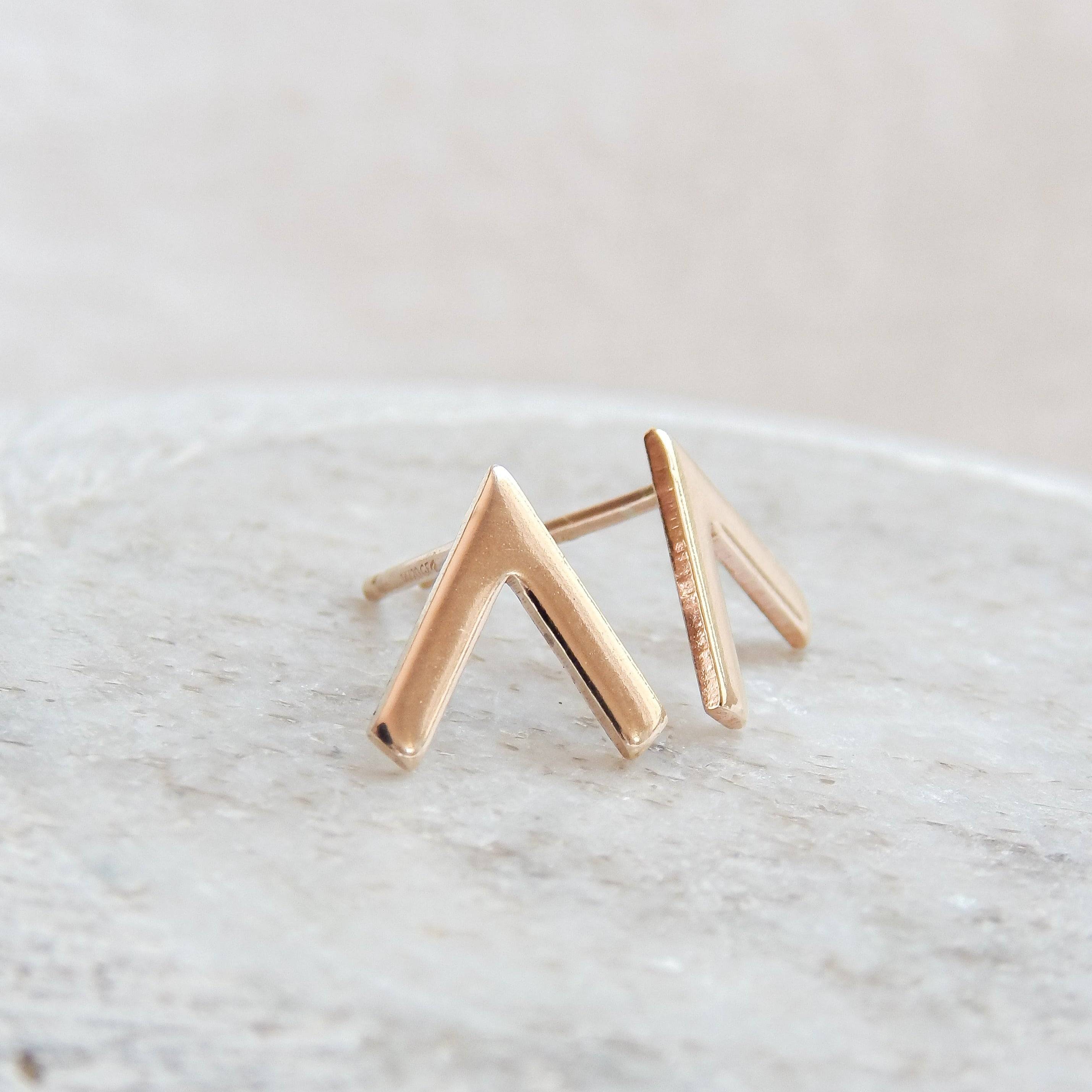 Close-up of Hypoallergenic Chevron Stud Earrings in 14k Gold Fill, minimalist V-shaped design by Barberry & Lace Jewelry.