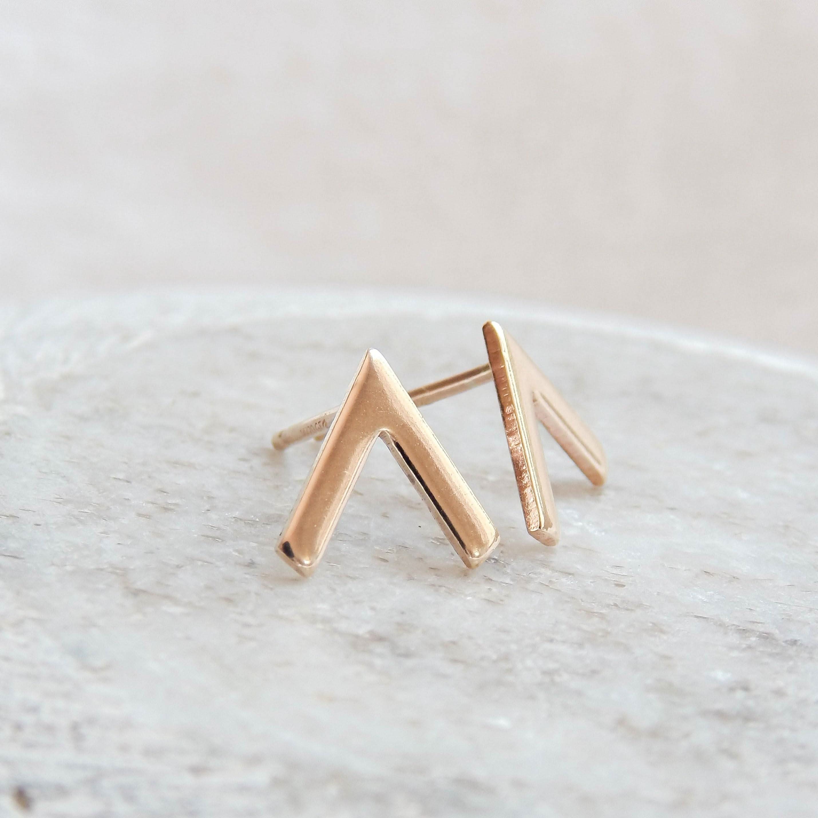 Close-up of Hypoallergenic Chevron Stud Earrings in 14k Gold Fill, minimalist V-shaped design by Barberry & Lace Jewelry.