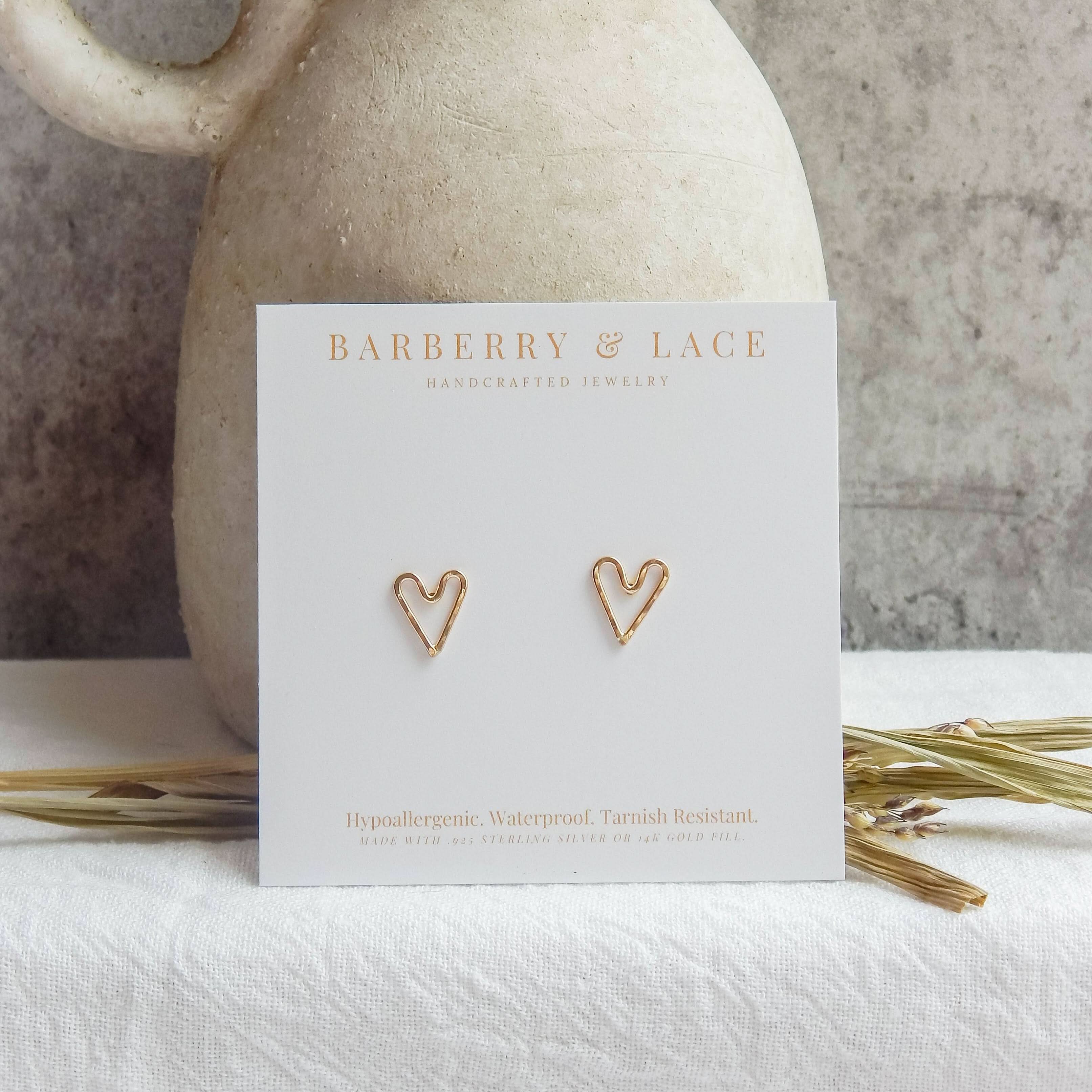 Barberry & Lace Hammered Heart Stud Earrings on product card with rustic background, ideal for gifting and everyday elegance.