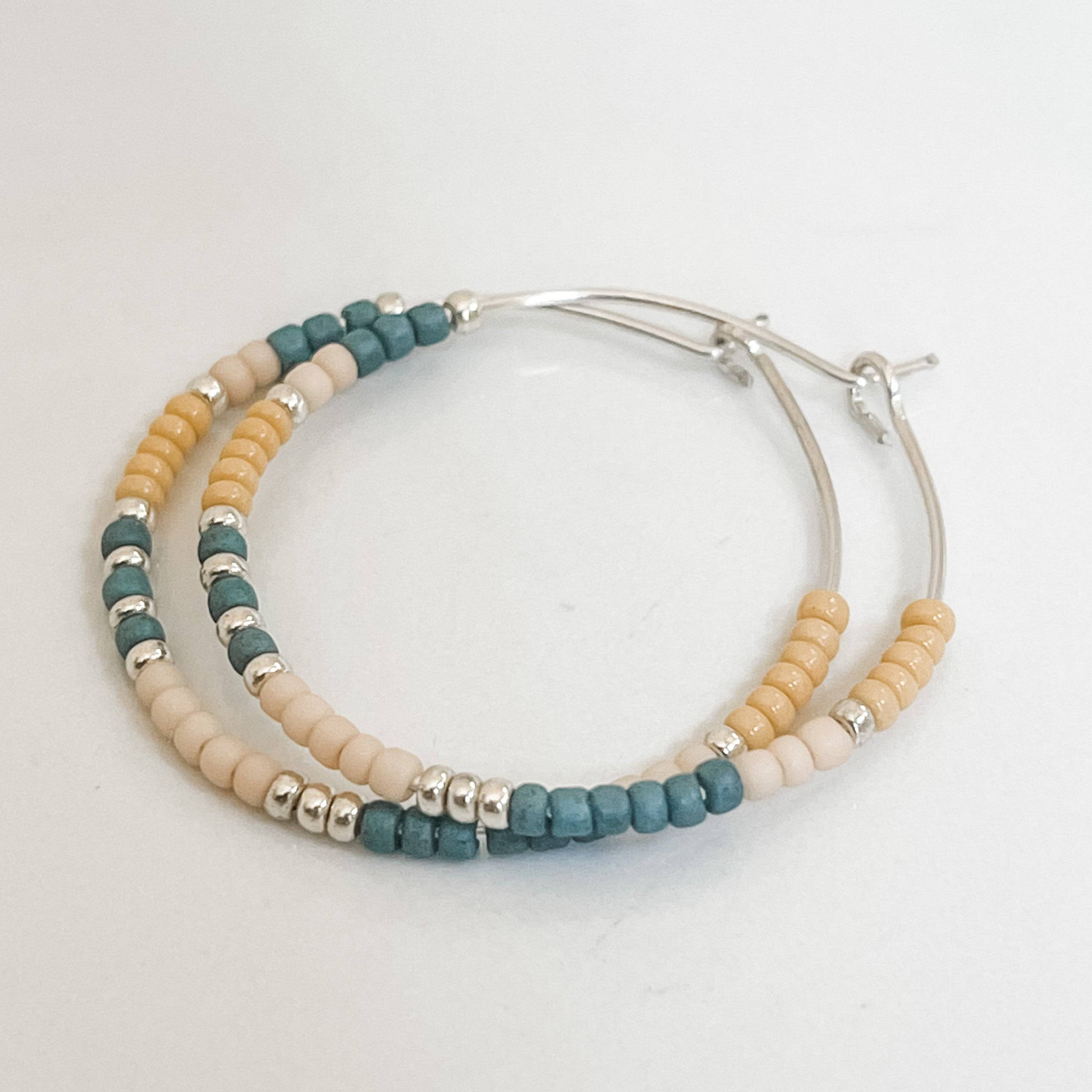 Sweater Weather Fall Edition - Beaded Hoop Earrings with teal and cream beads on sterling silver hoops. Hypoallergenic and tarnish resistant.
