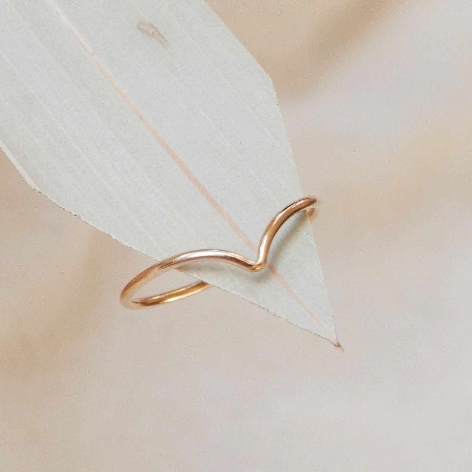Chevron Stacking Ring by Barberry & Lace Jewelry in 14k Gold Fill, displayed on a neutral leaf background for minimalist elegance.