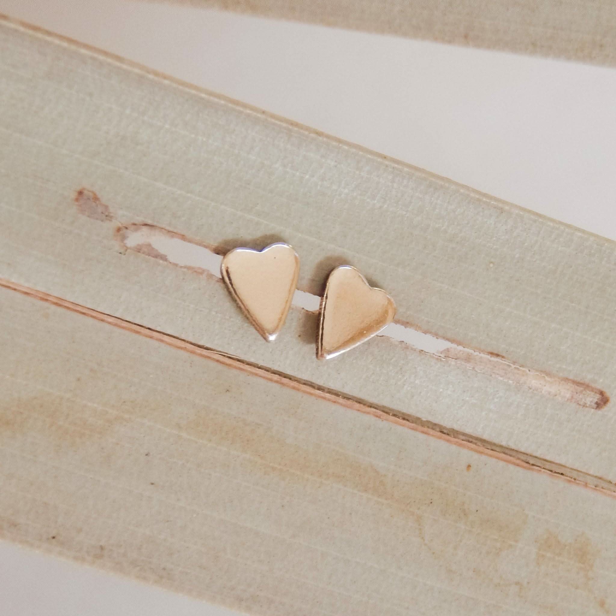 Heart Stud Earrings by Barberry & Lace Jewelry in 14k Gold Fill, displayed on a neutral background. Dainty and hypoallergenic design.