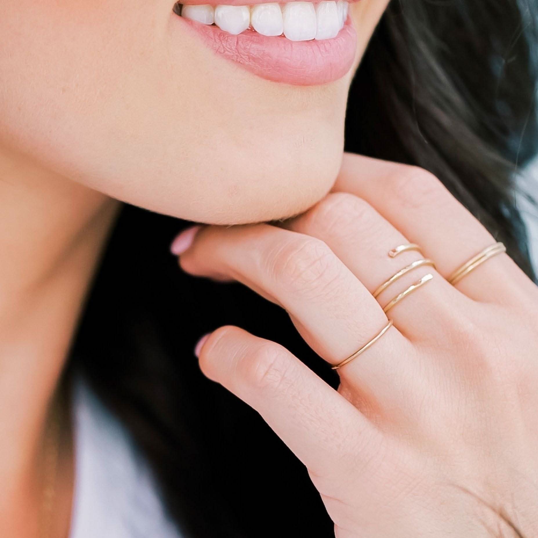 Model wearing the Waterproof Hammered Wrap Ring in 14k Gold Fill, showcasing its elegant and hypoallergenic design for everyday wear.