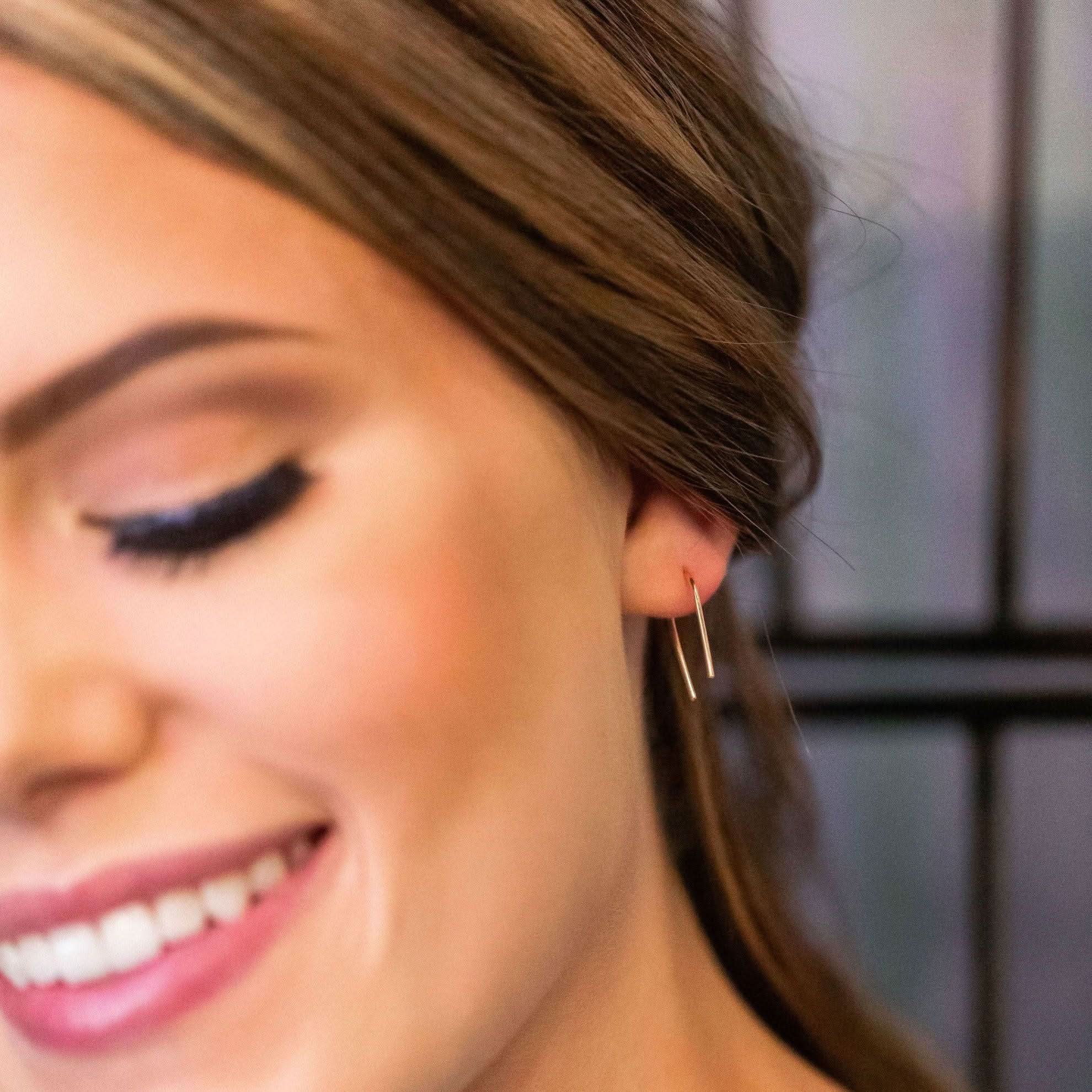 Woman wearing Minimalist Open Arc Earrings by Barberry & Lace, highlighting their elegant and lightweight everyday style.