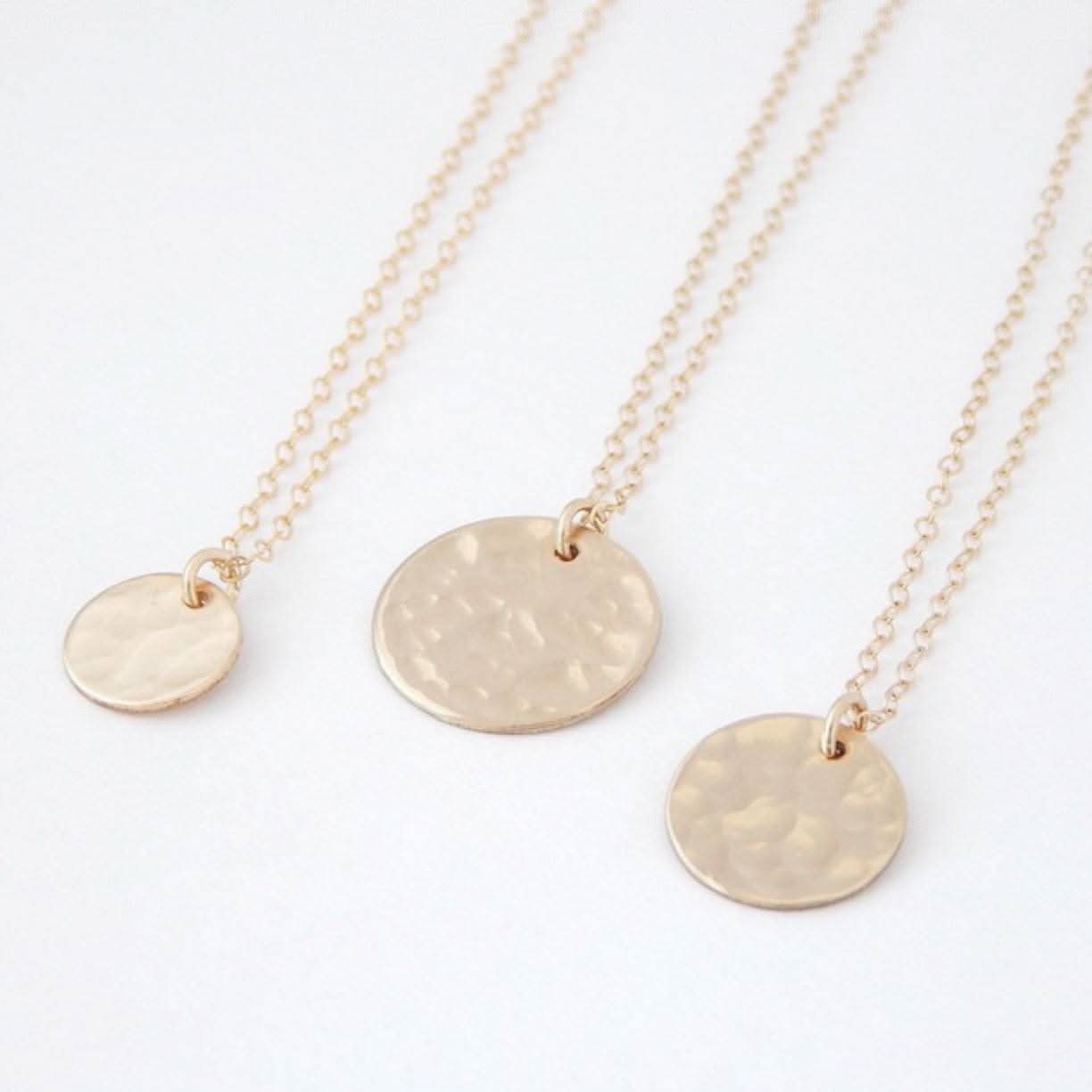 Three sizes of Layering Hammered Disc Necklaces in 14k Gold Fill displayed on a white background, ideal for mixing and matching styles.