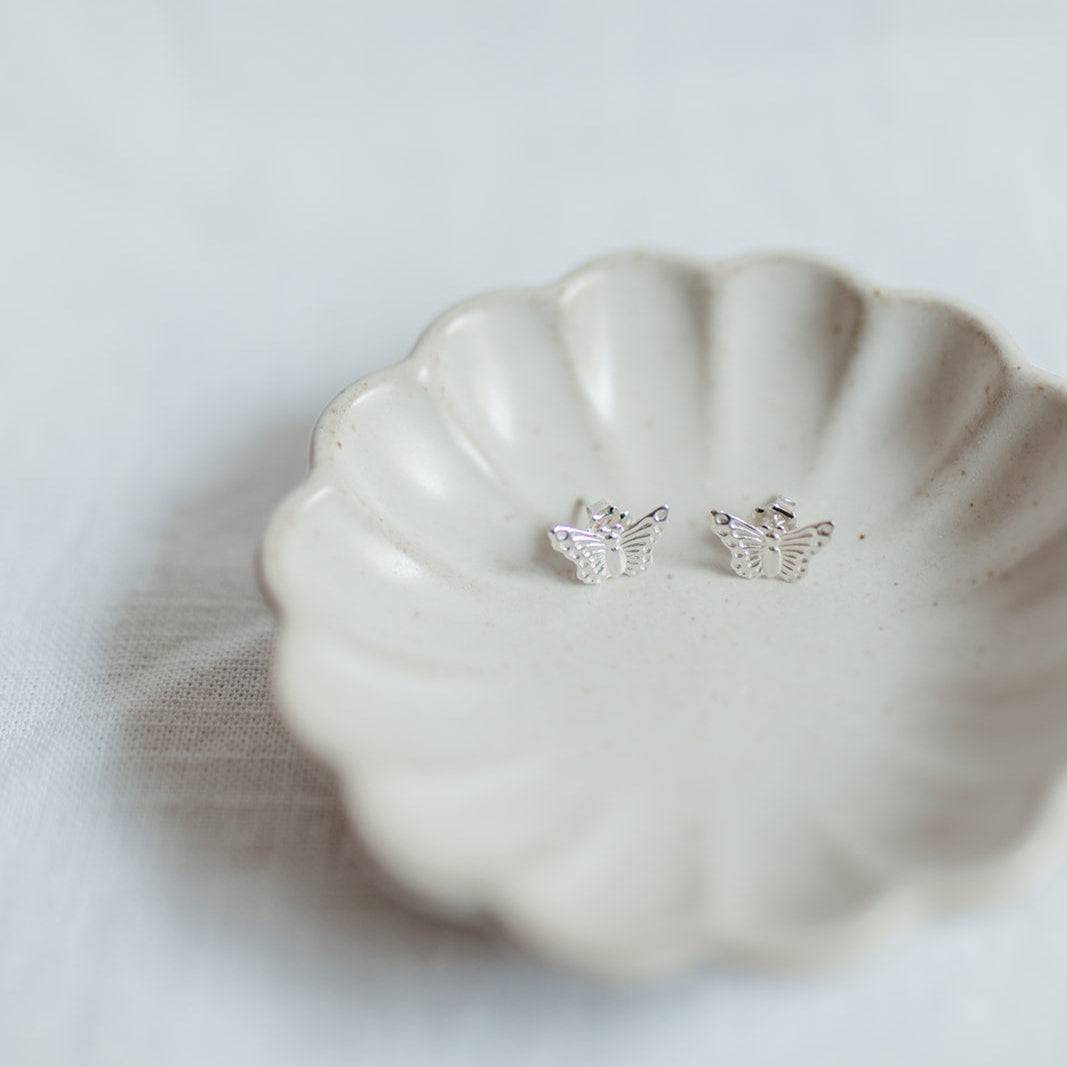 Sterling Silver Butterfly Stud Earrings from Barberry & Lace Jewelry, delicate and tarnish-resistant for daily wear.