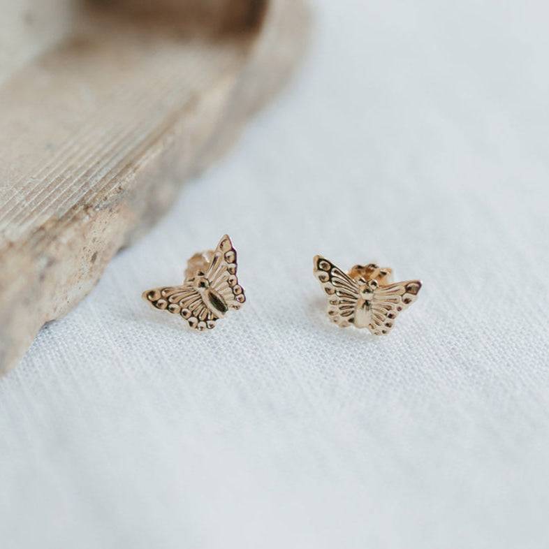 Gold Butterfly Stud Earrings by Barberry & Lace Jewelry, hypoallergenic and waterproof, ideal for everyday feminine charm.