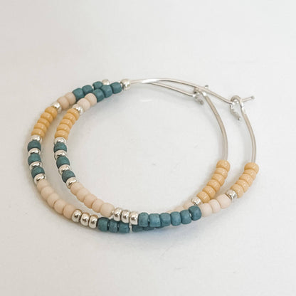Sweater Weather Fall Edition - Beaded Hoop Earrings with teal and cream beads on sterling silver hoops. Hypoallergenic and tarnish resistant.