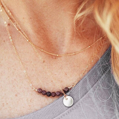 Layered Satellite Chain Necklace styled with gemstone and disc pendants, showcasing minimalist gold layering from Barberry & Lace Jewelry.