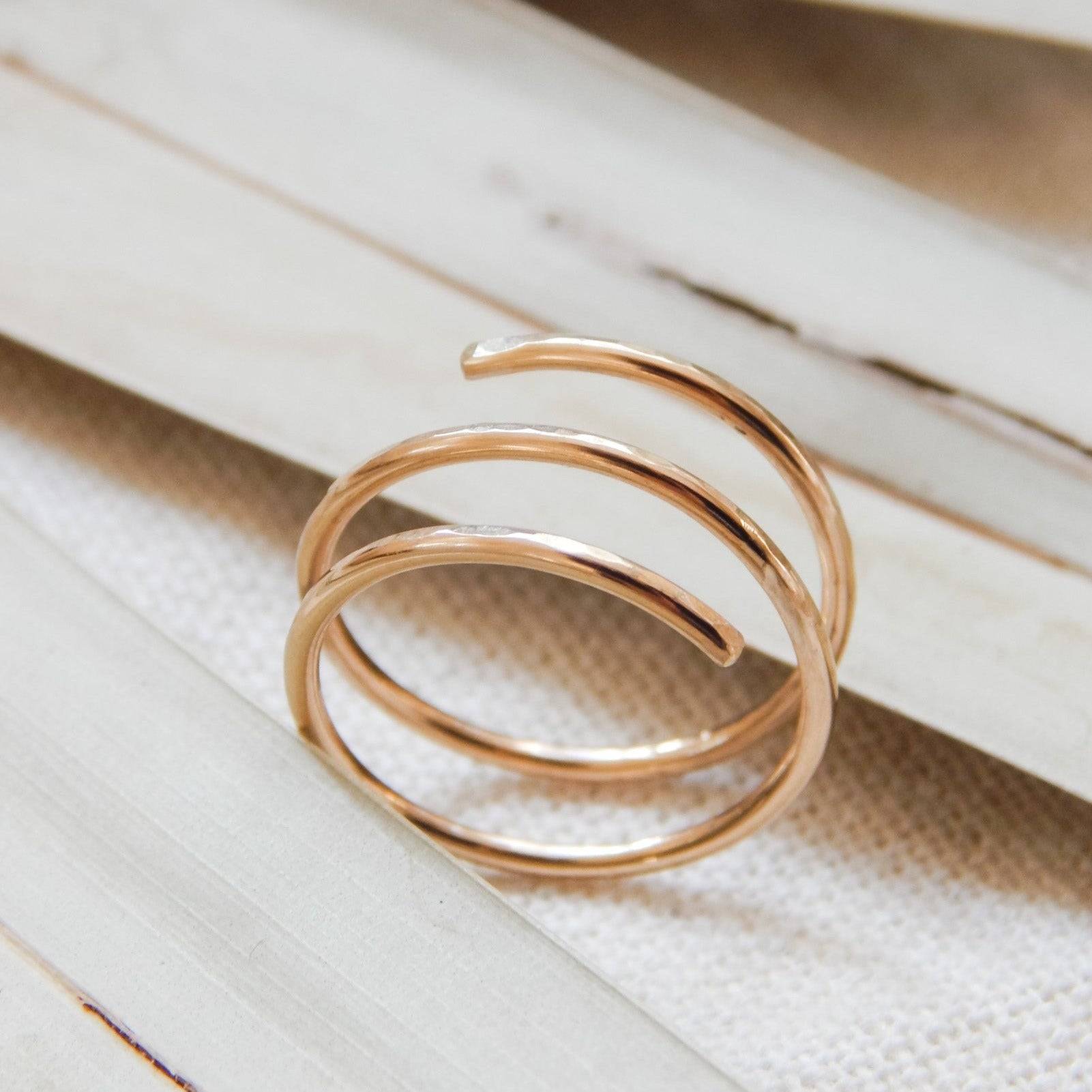 Close-up of the Waterproof Hammered Wrap Ring in 14k Gold Fill, highlighting its hammered texture and open wrap style.