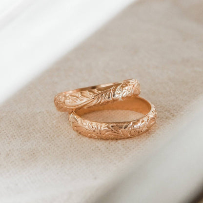 Romantic Floral Band Ring in gold with detailed floral patterns, perfect for feminine jewelry collections and everyday elegance.