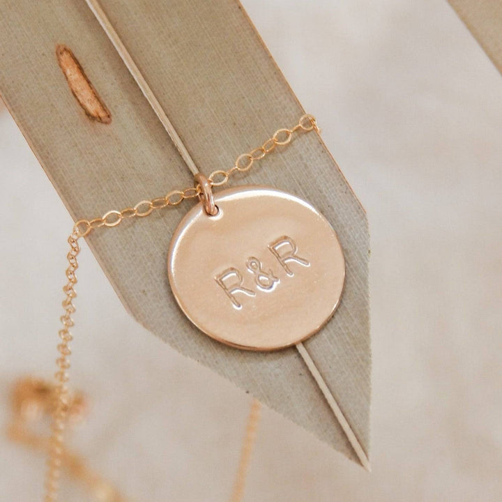 5/8" Personalized Disc Necklace by Barberry & Lace Jewelry featuring custom engraved initials on a 14k gold filled disc, perfect for a timeless look.