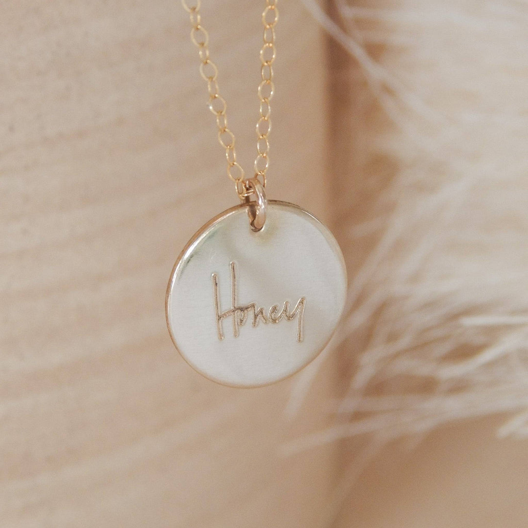 Handwritten Disc Necklace by Barberry & Lace Jewelry featuring 'Honey' engraving on a gold fill disc, perfect for personalized gifts.