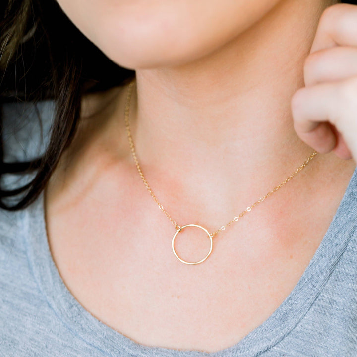 Minimalist Dainty Open Ring Necklace by Barberry & Lace worn on the neck. Lightweight and hypoallergenic for modern everyday style.