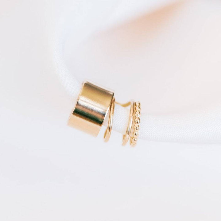Set of no-pierce ear cuff earrings in 14k gold fill, featuring smooth, double band, and beaded textures from Barberry & Lace Jewelry.
