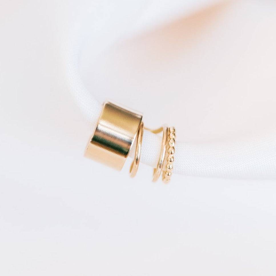 Set of no-pierce ear cuff earrings in 14k gold fill, featuring smooth, double band, and beaded textures from Barberry & Lace Jewelry.