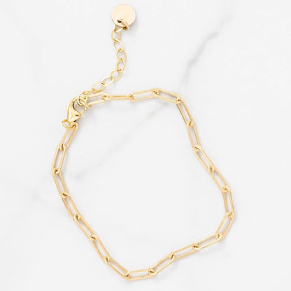 Layering Paperclip Chain Bracelet in 14k gold fill with adjustable clasp, perfect for everyday wear and stacking with other jewelry.