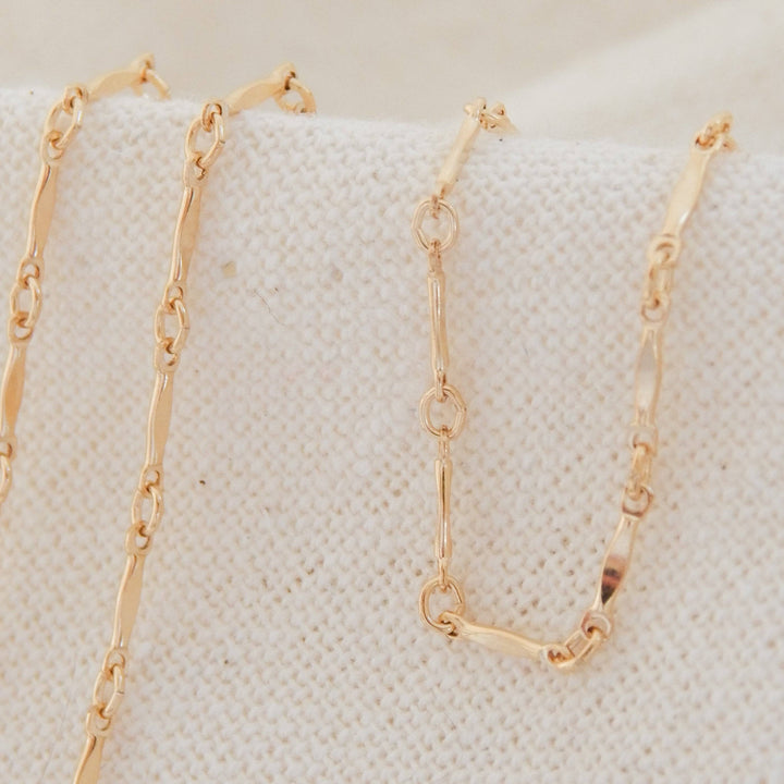 Layering Dainty Bar Necklace in 14k gold fill with delicate bar and link chain design, ideal for minimalist jewelry lovers and everyday wear.